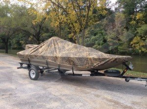 boat with camo boat cover